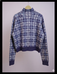 CHECKERED MOCK NECK SWEATER.